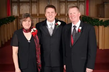 groom and his parents -- image used under license from istock photo
