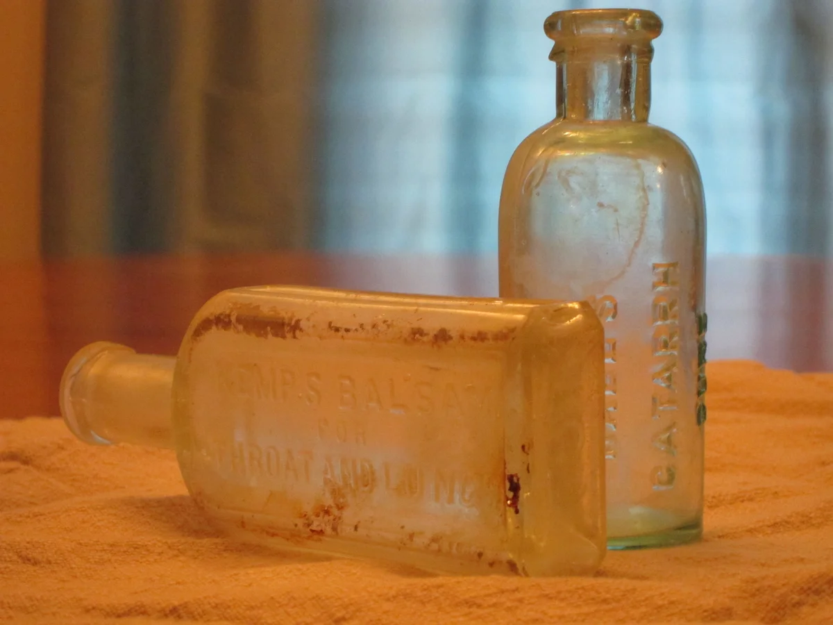 two antique bottles
