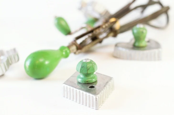 green handled vintage cookie cutters