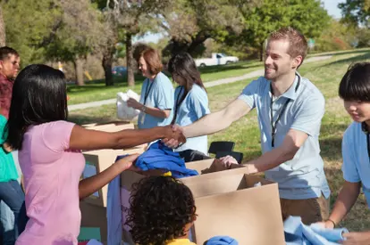 Shaking a volunteer's hand