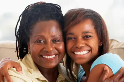 Happy mother and teenage daughter
