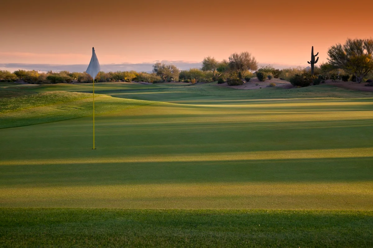 desert golf course at sunset