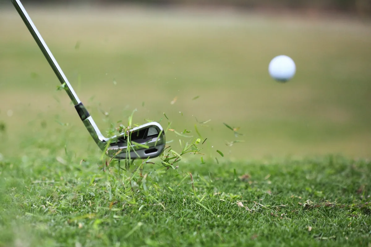 a golf shot just after impact