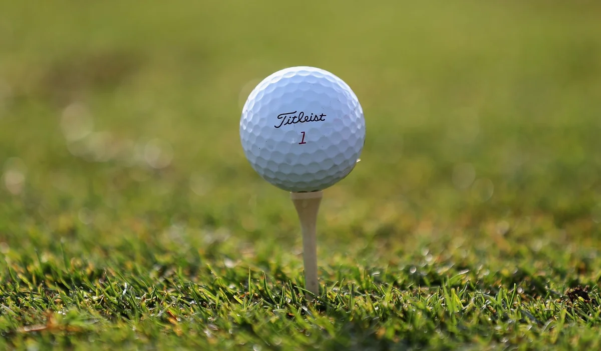 Titleist golf ball on a tee