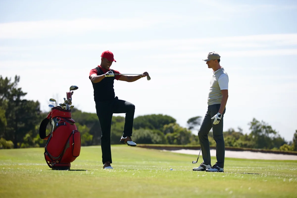 frustrated golfer about to snap club