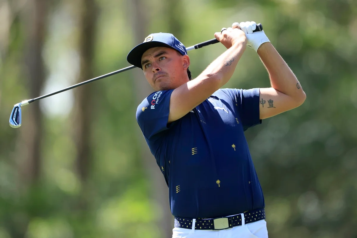 Rickie Fowler hits a golf shot