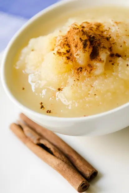 Spiced apple sauce with extra cinnamon sprinkled on top