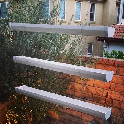 Rain gutter vertical planters

https://www.flickr.com/photos/majamaki/8584810296/sizes/m/in/photostream/
