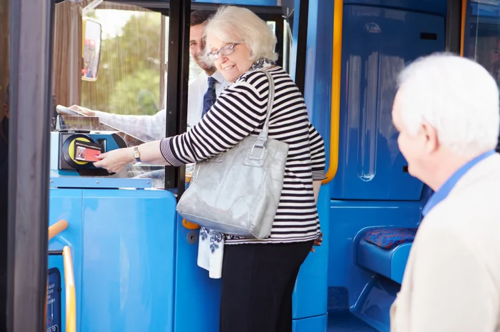 Seniors boarding a bus