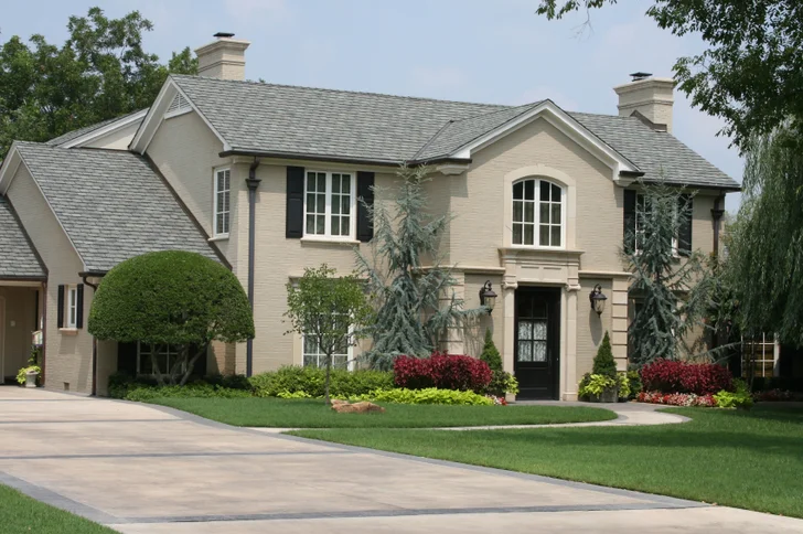 House with Blue Spruces