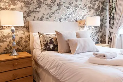 Modern bedroom with floral decoration
