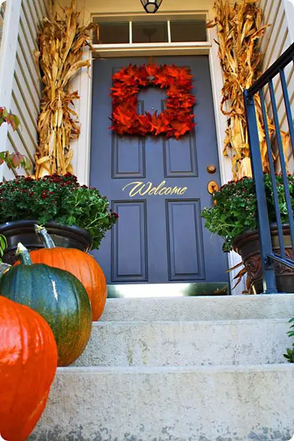 Painted welcome words door http://www.eventtrender.com/blog/2011/10/fall-outdoor-porchscape-contest.html