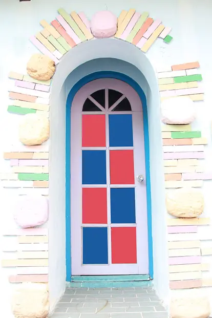 blue and pink squares painted on door