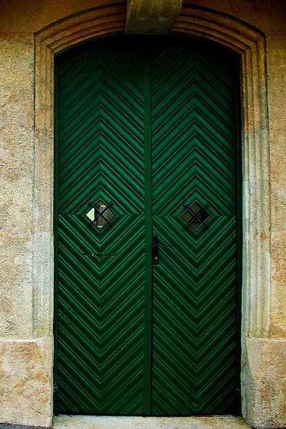 dark green painted door http://www.istockphoto.com/photo/fancy-ornamental-door-1950798?st=2a14b08