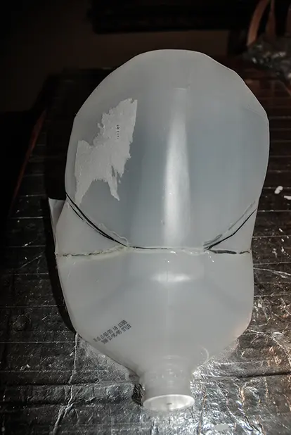Assembly cut milk jug pieces