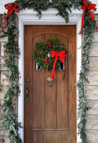Christmas door wreath and red bows