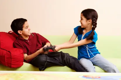 Siblings playing