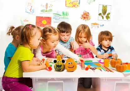 Happy kids making crafts