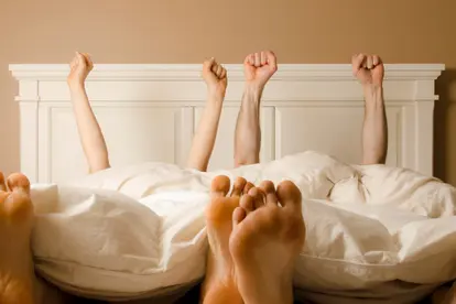 happy couple in bed