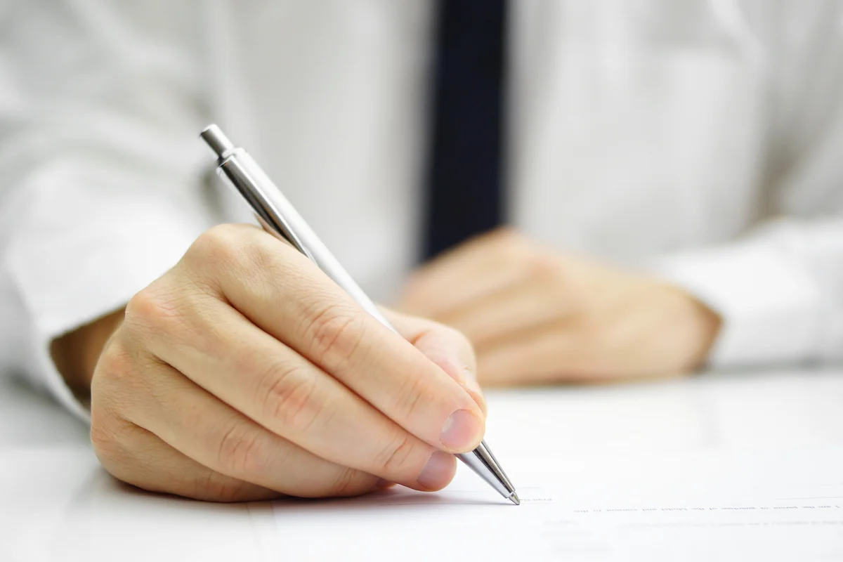 signing paper