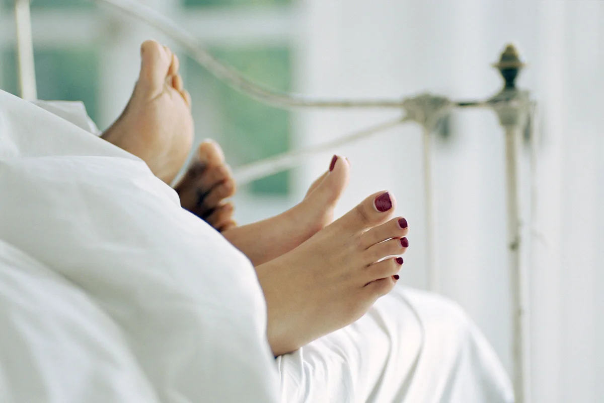 Couple lying in bed
