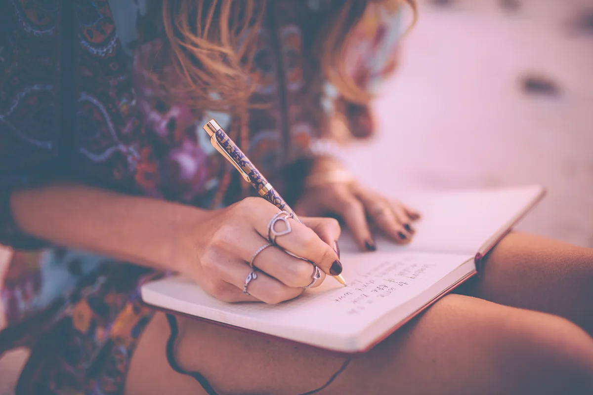 Girl writing in her diary