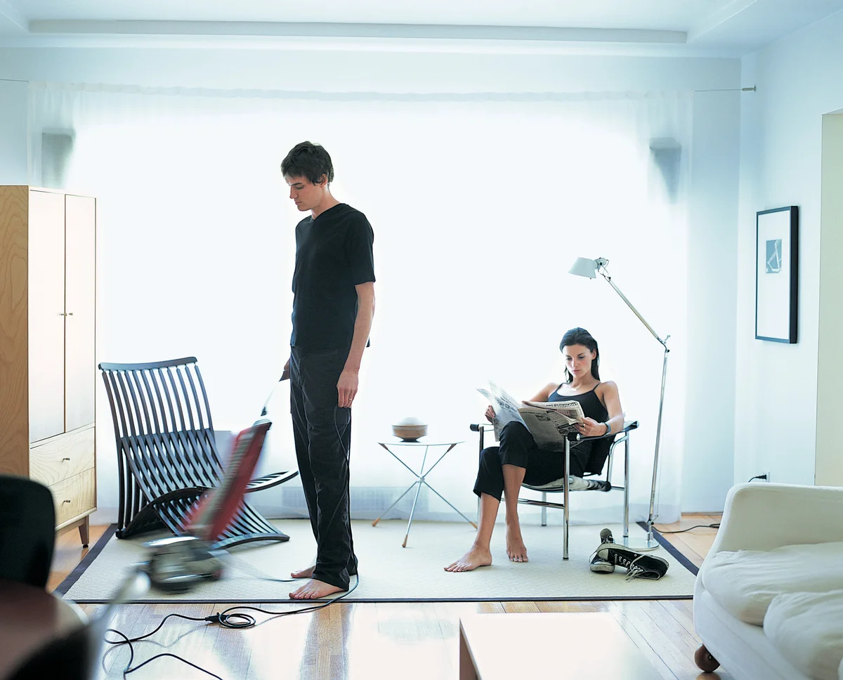 man vacuuming