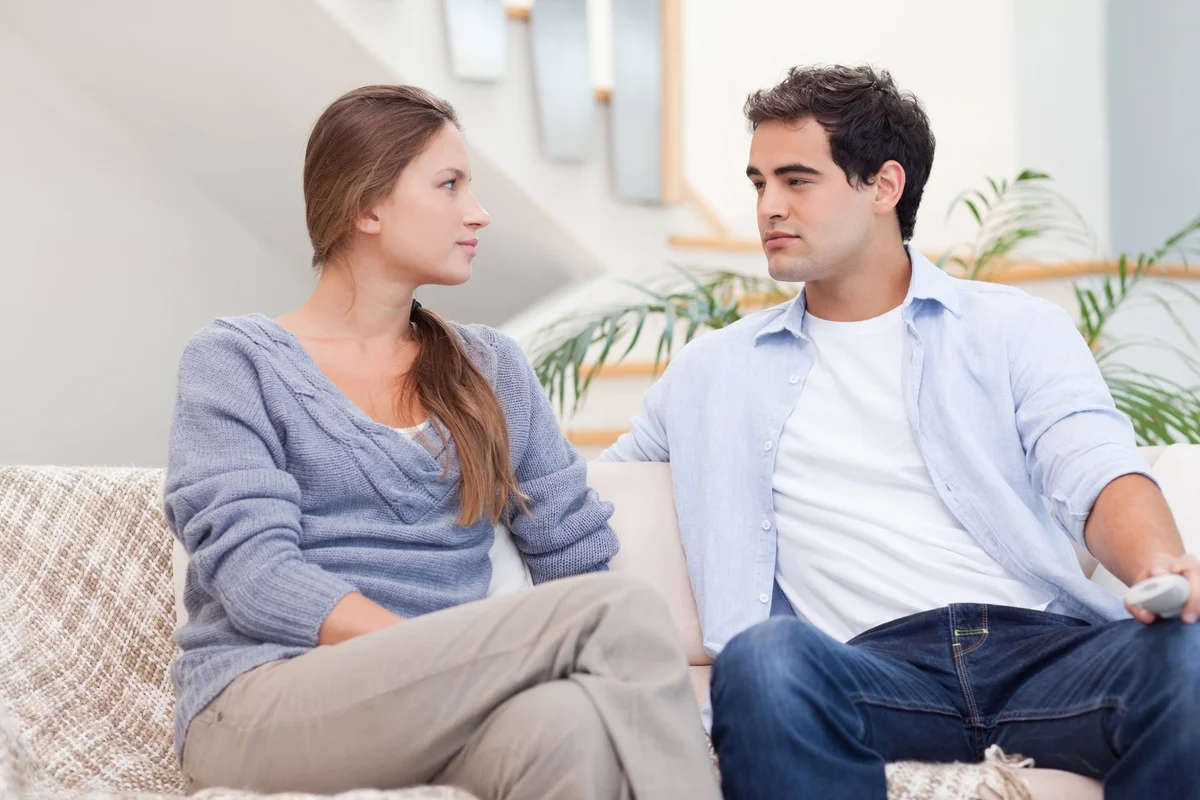 Couple sitting on couch