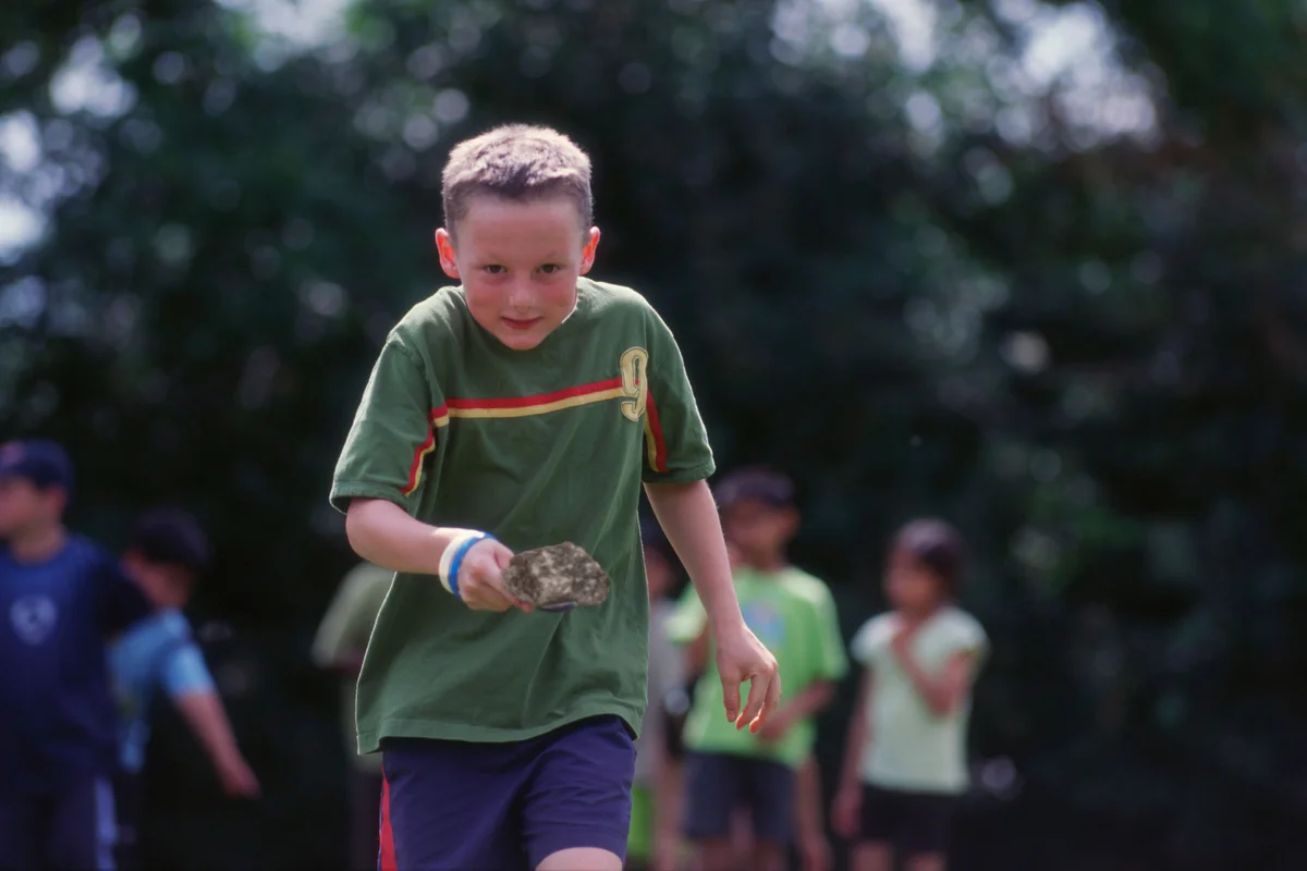 Boy in relay race