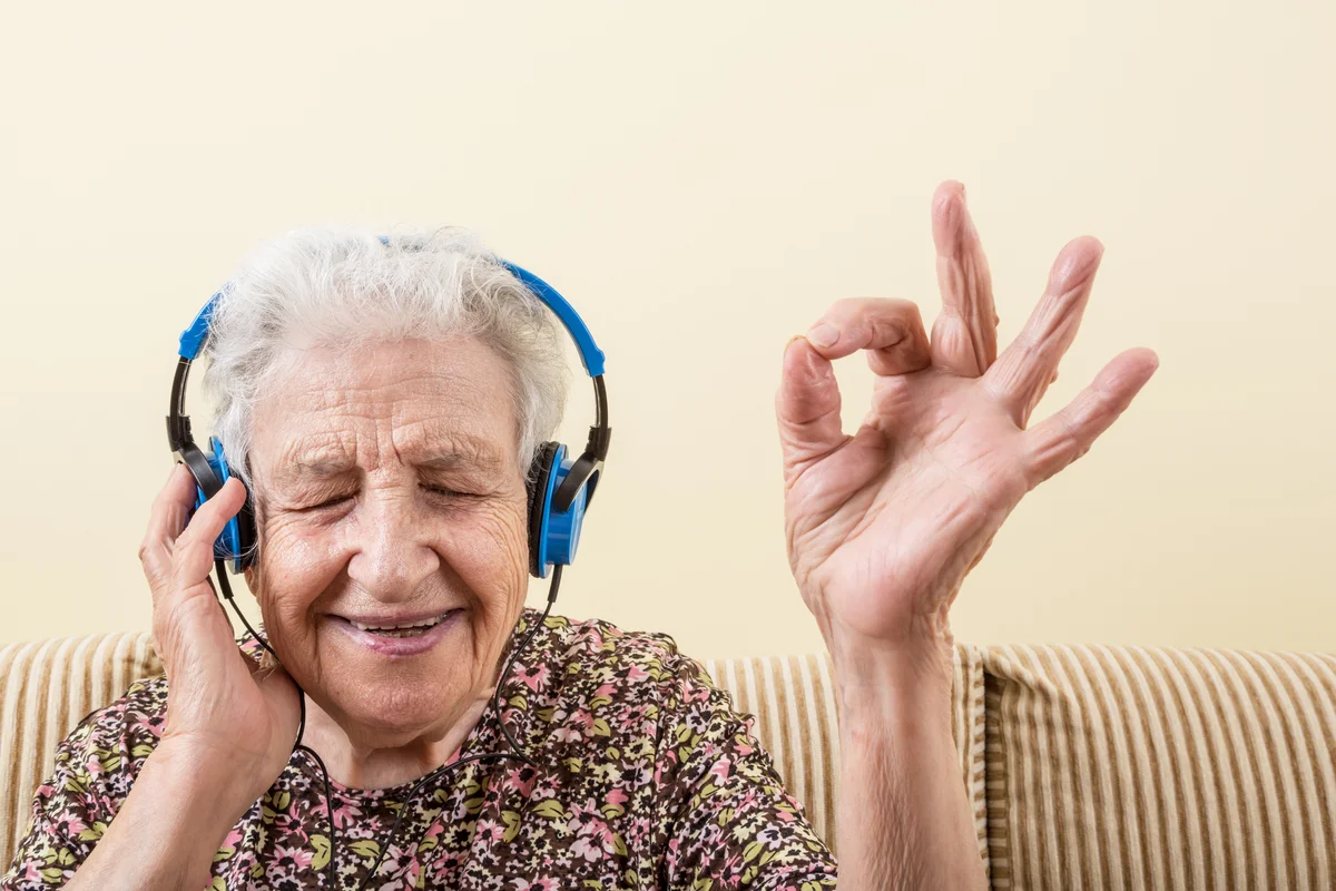 senior woman with headphones