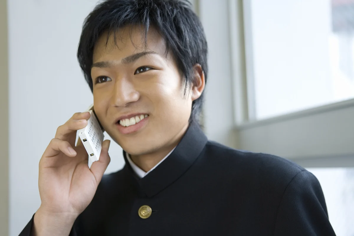 Boy using mobile phone