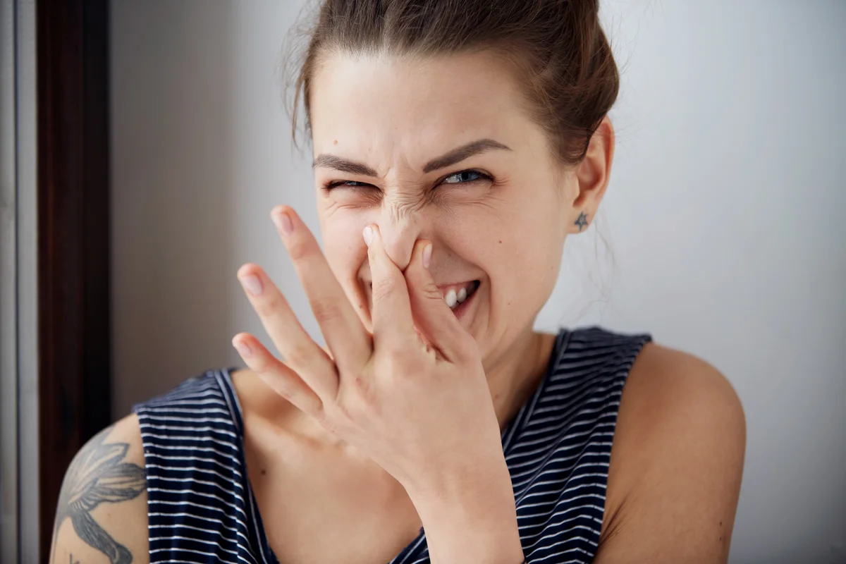 Female gesture smells bad