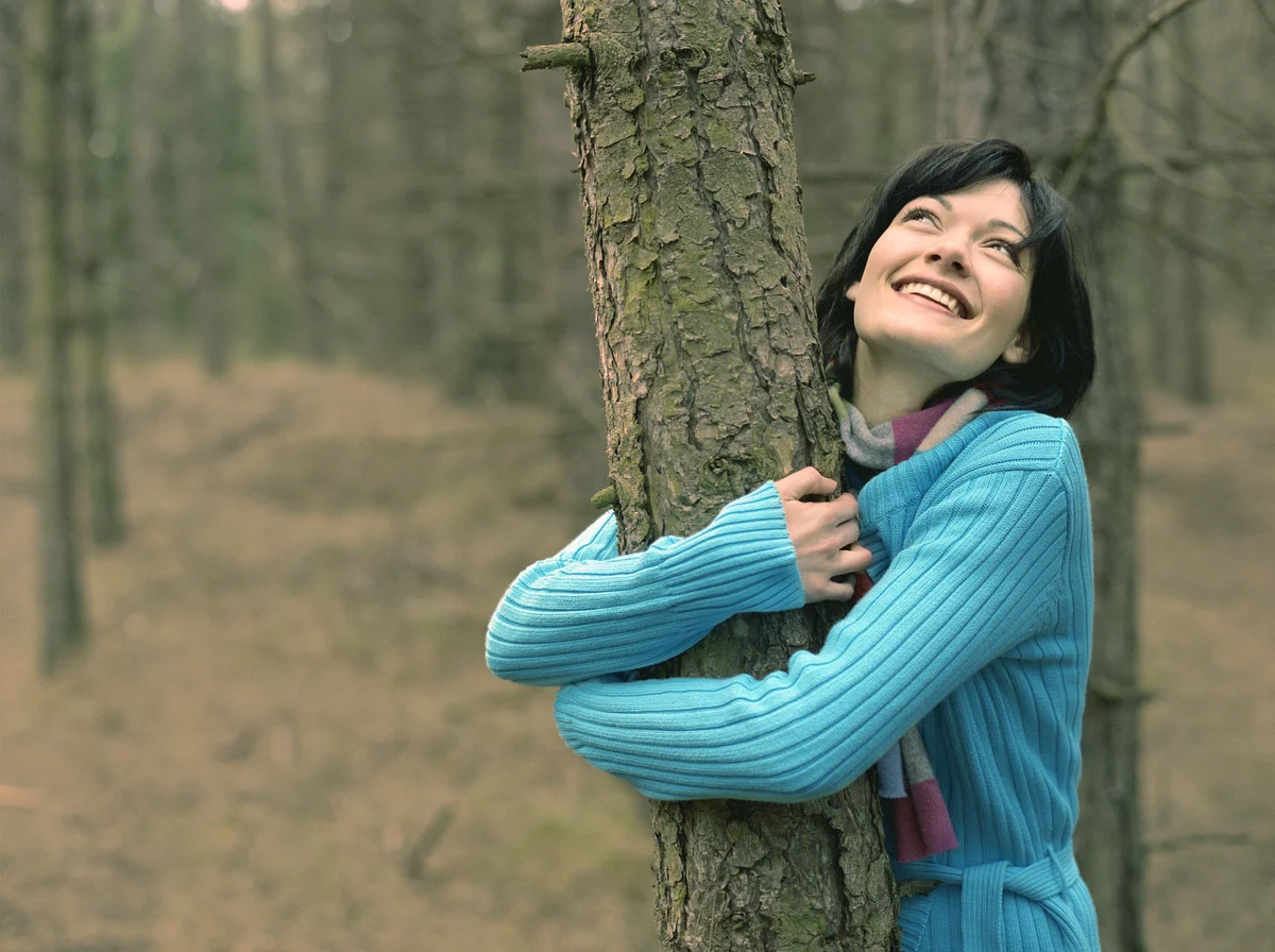 Arms around tree
