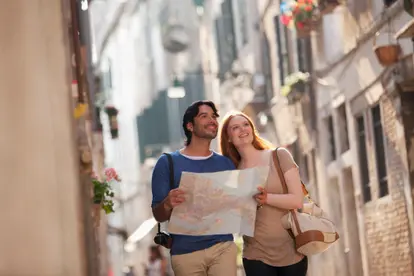 Smiling couple on street