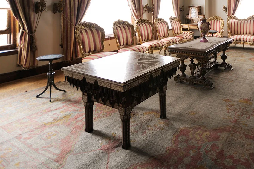 Uniformly faded antique Turkish rug