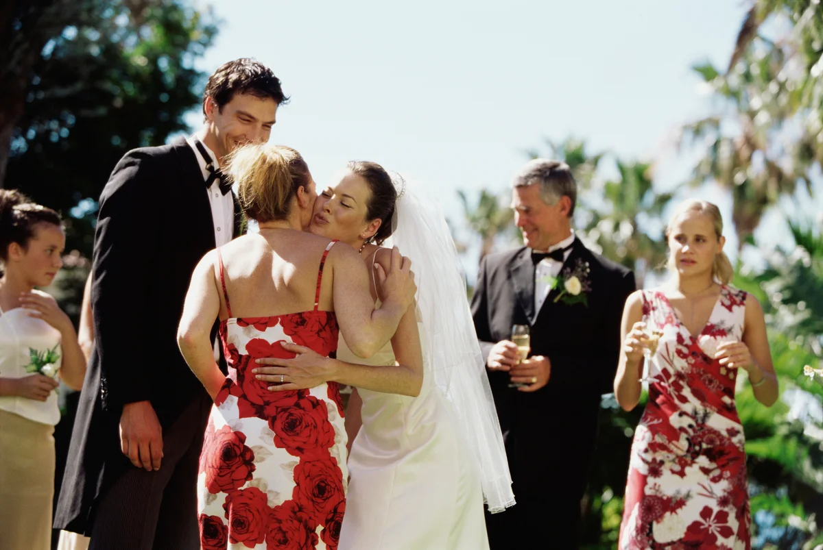 Bride and groom greeting guests
