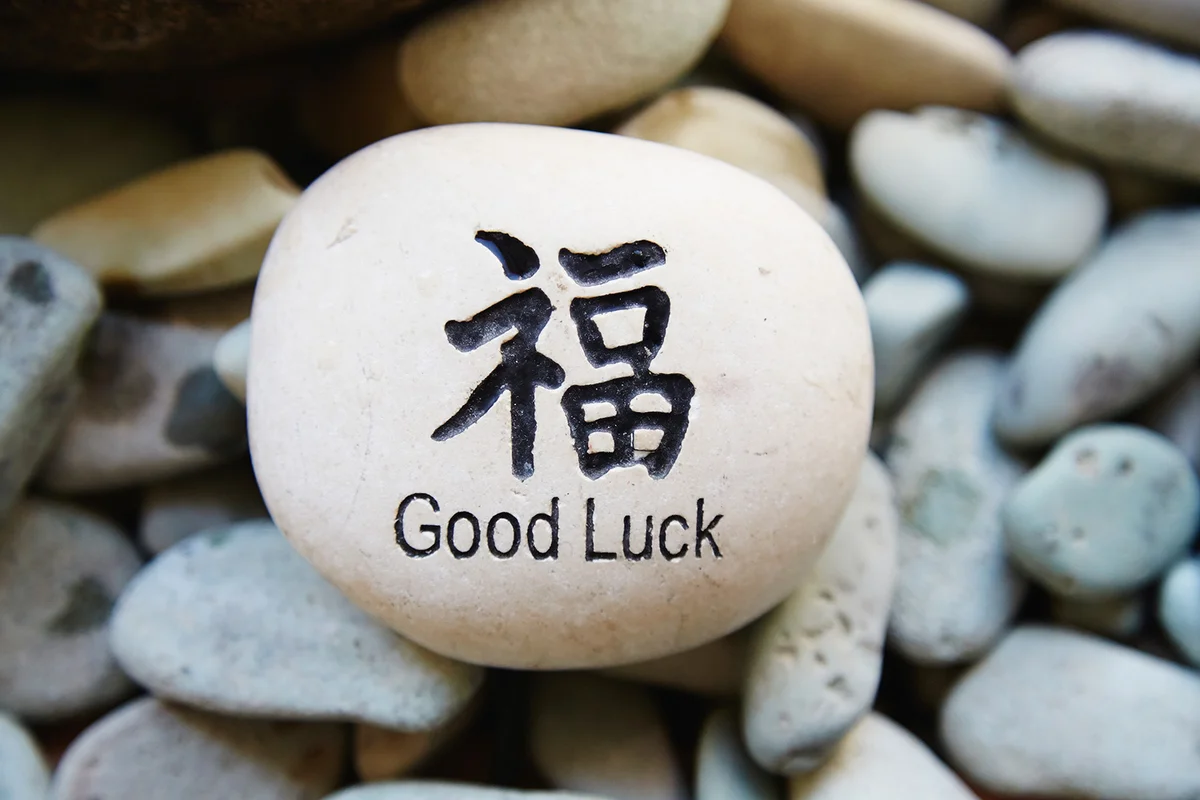 Good luck in Chinese lettering on stone.