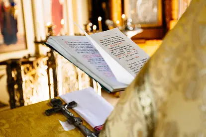 christian priest reading