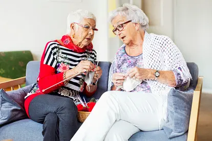 Senior women knitting