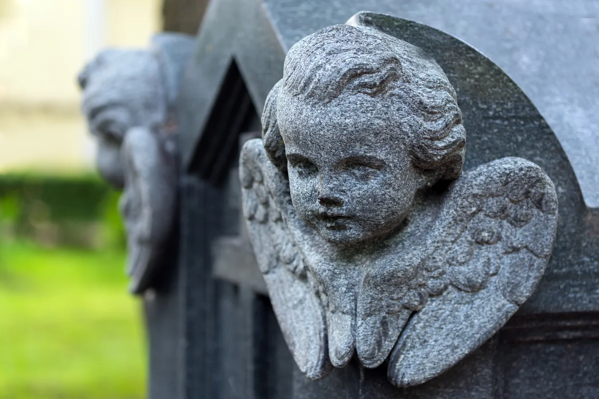 headstone with angels