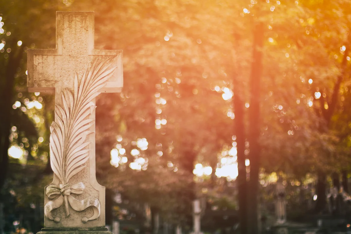 cross with palm leaf