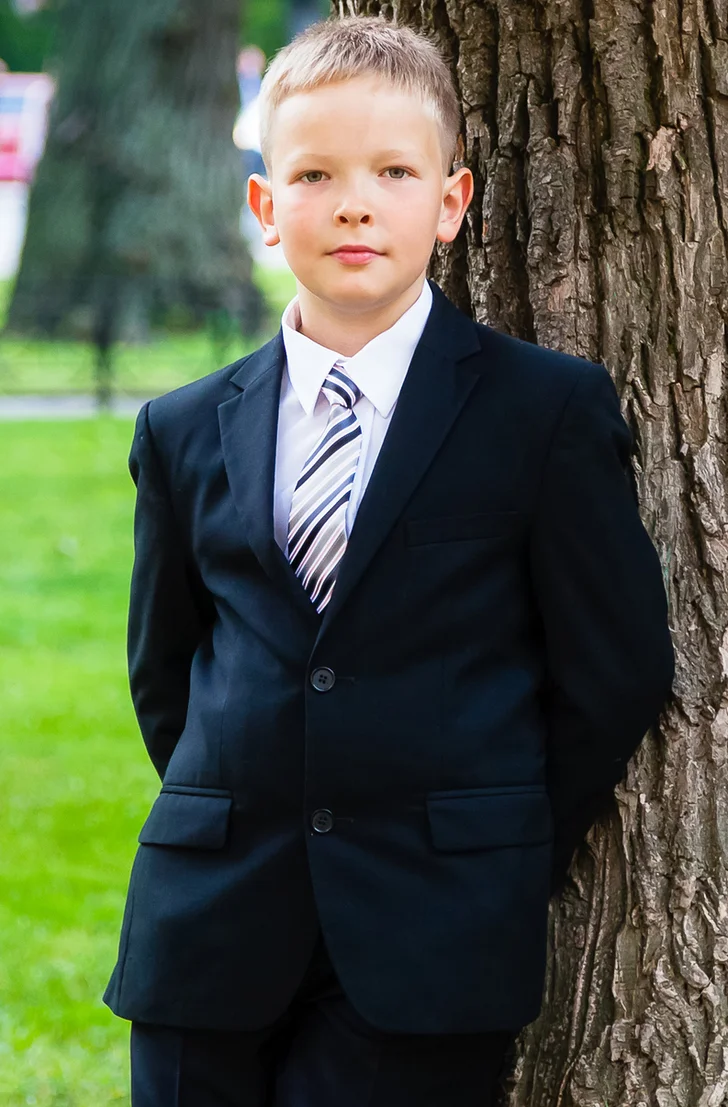 young boy in suit