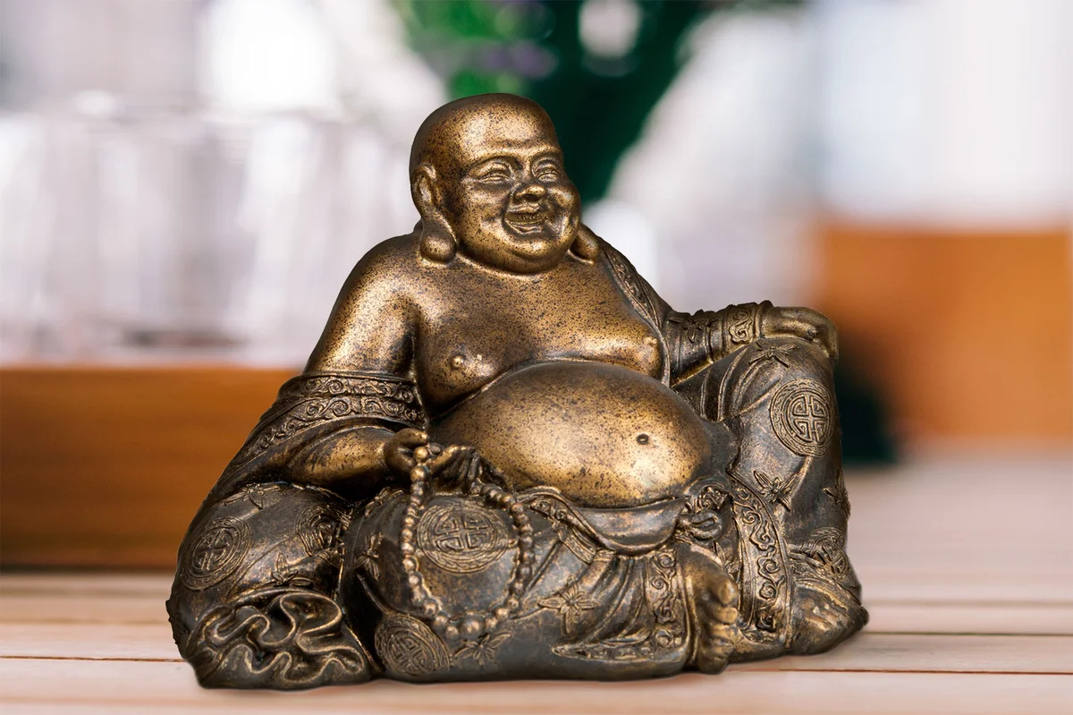 Laughing Buddha on table