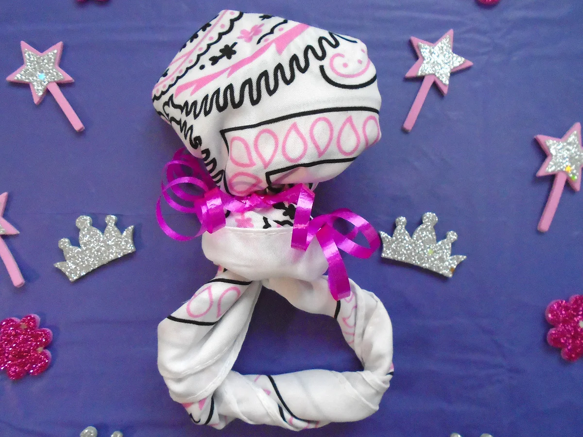 Finished Baby Rattle Napkin Fold