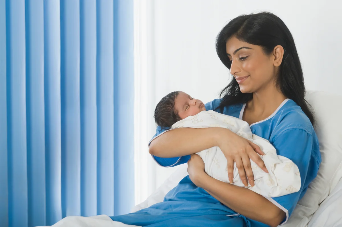 Woman looking at her baby
