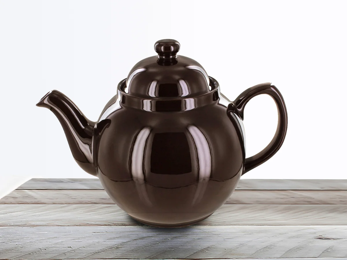 Teapot on wooden table