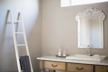 antique tub and ladder towel rack