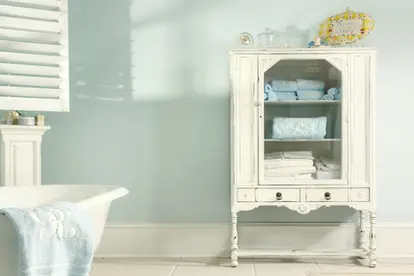 china cabinet in light-colored bathroom