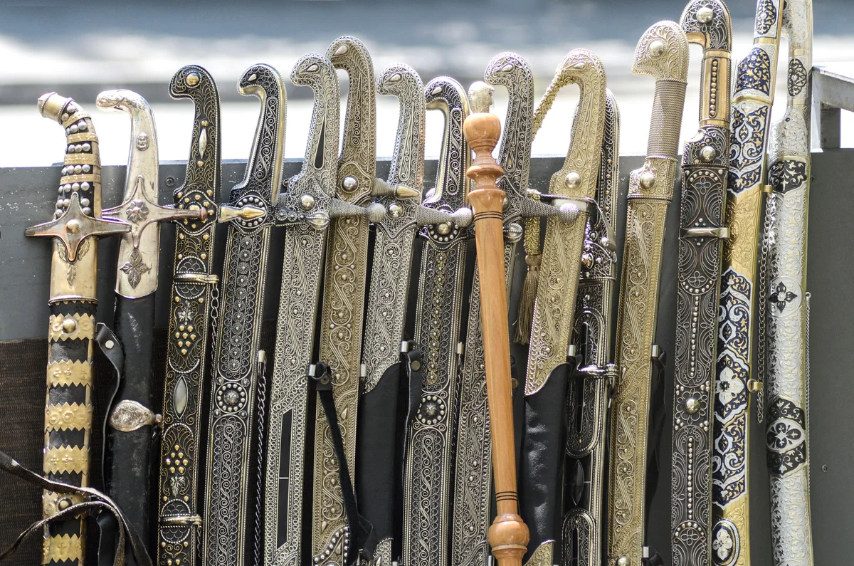 row of ornate ancient swords