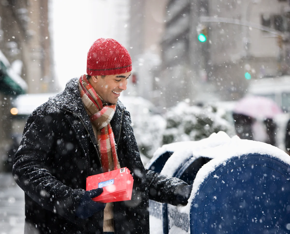 Man mailing xmas cards